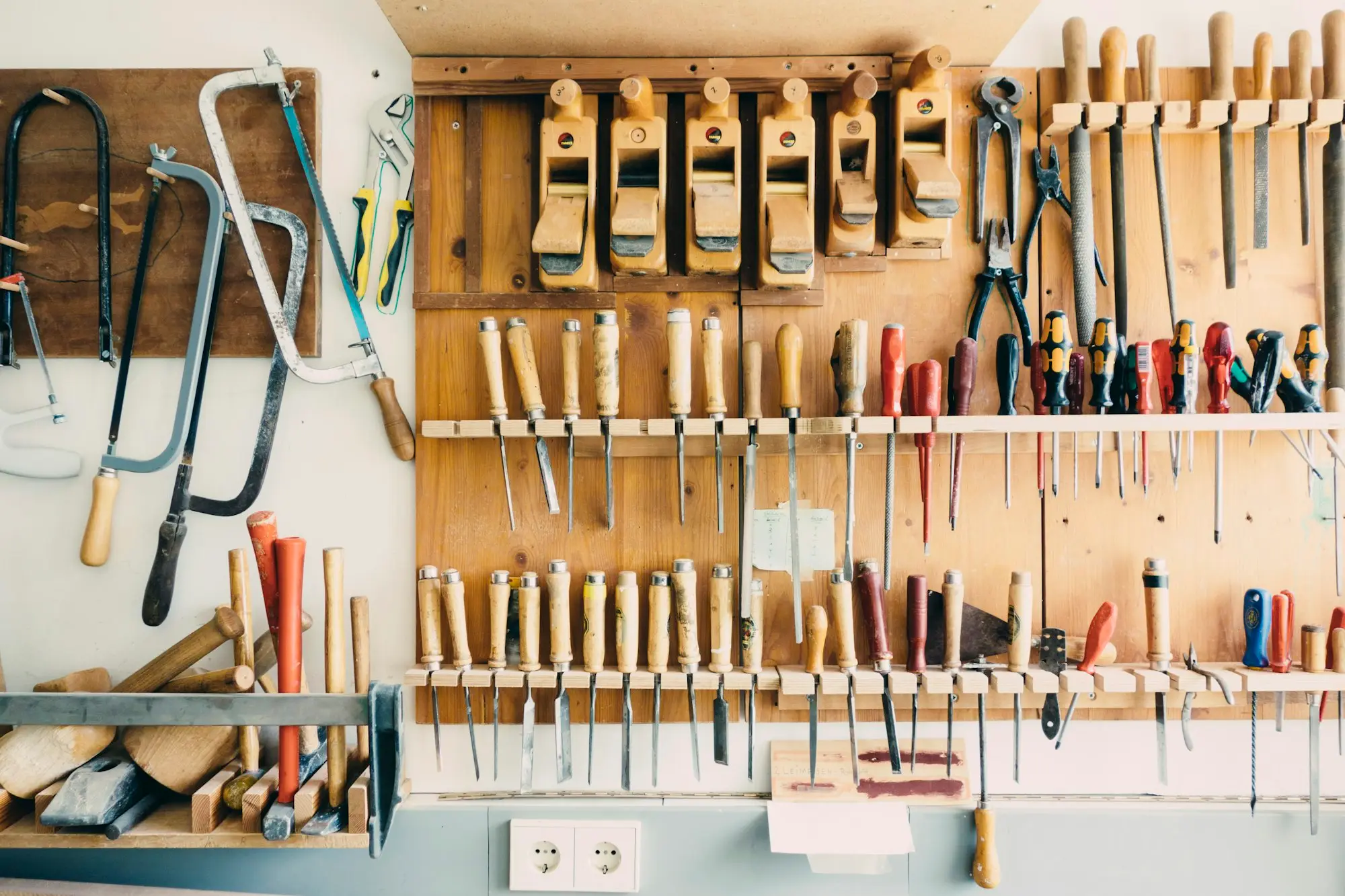 Rack of hand tools in a trade workshop