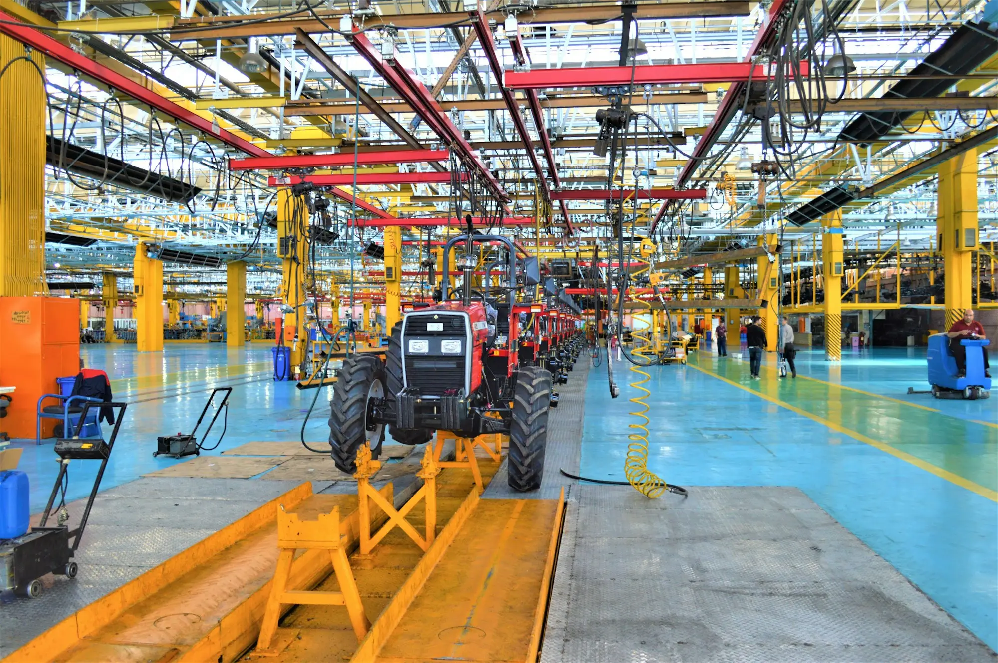 Factory floor lined with production machinery, the kind of equipment businesses fund with an equipment loan